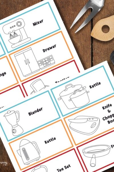 SPL Graphics – Kitchen Pretend Play Pack (1) Kitchen Pretend Play Pack pages on a table