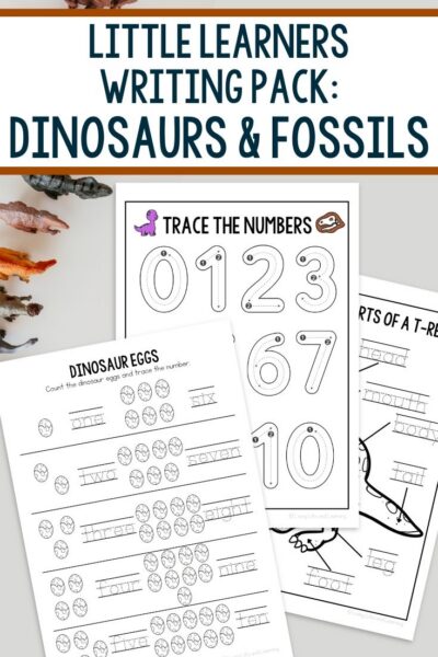 Little Learners Writing Pack: Dinosaurs & Fossils pages on a table