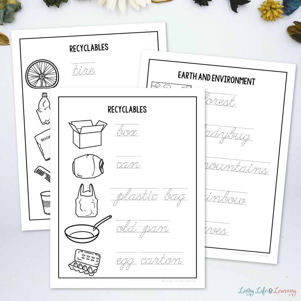Junior Scientist Writing Pack: Earth & Environment pages on a table