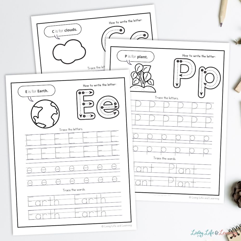 Little Learners Writing Pack: Earth & Environment pages on a table